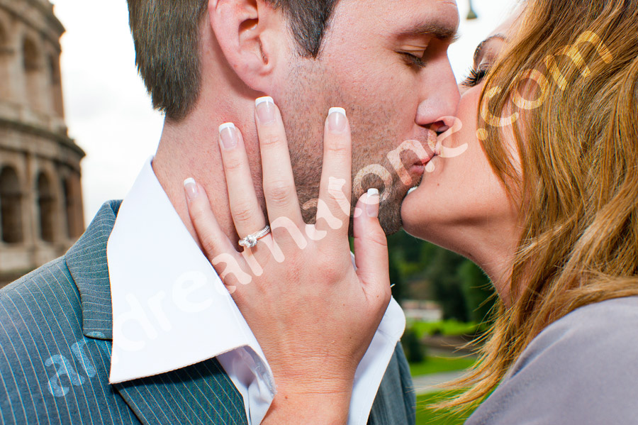 rome-color-photo-047 Kissing during engagement session with ring close up