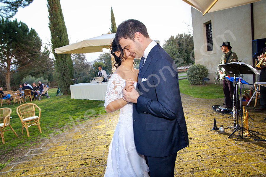 wedding-italy-124-1412 Newlyweds just married dancing together at the first dance