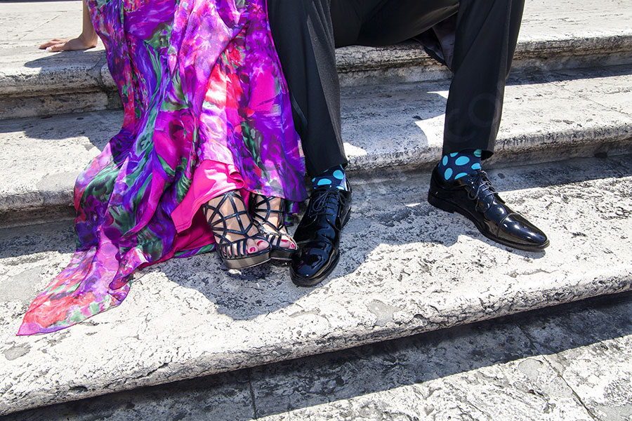 travel-photography-003 Couple's feet and legs. Extravagant look.