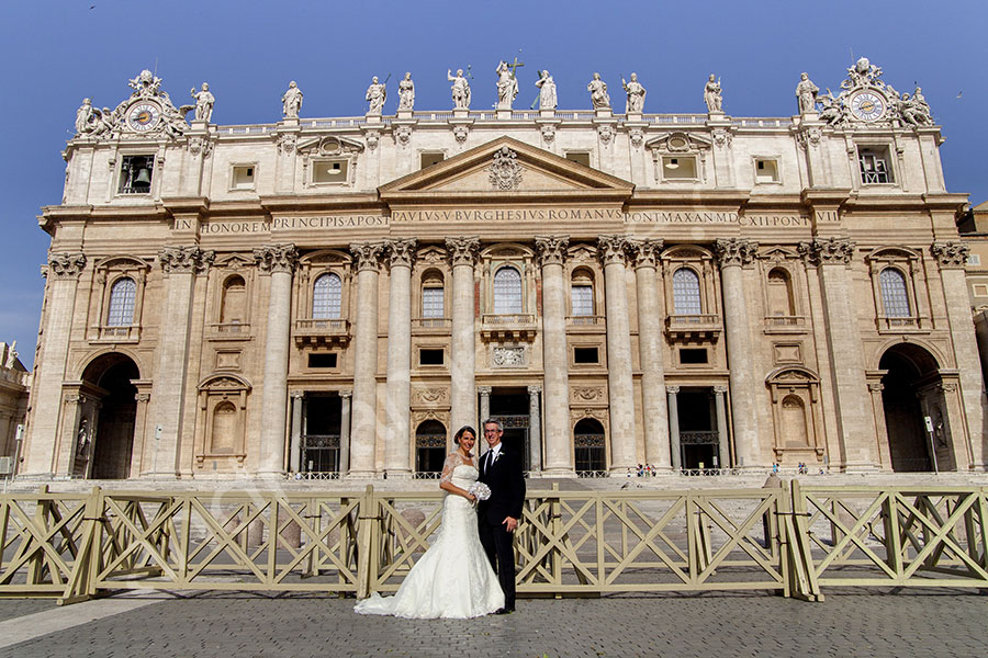 Couple photographed in front of Saint Peter's Basilica in the Vatican Italy
