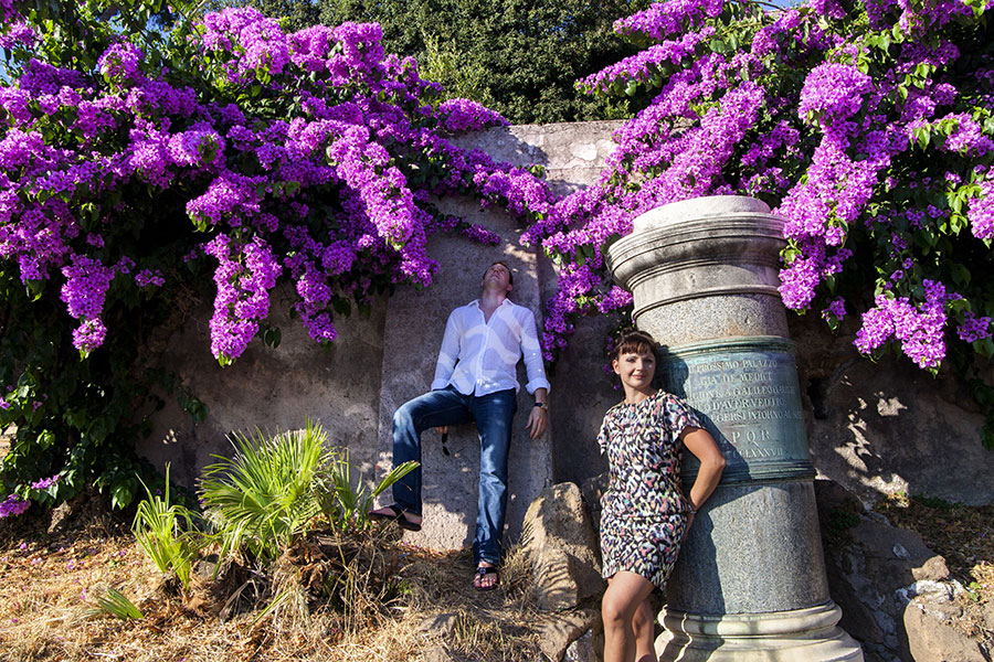 photographer-rome-1912-045 Posing for a photographer picture by purple flowers.