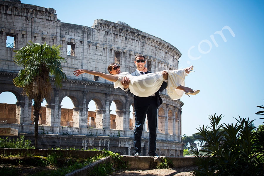 Holding wife after marriage. Celebrating together.