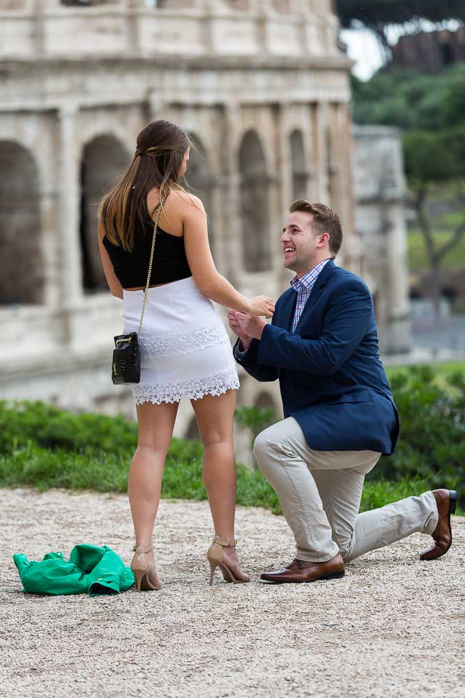 01-we-proposal Man proposing at the Roman Colosseum