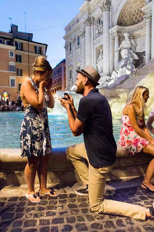 Romantic Trevi fountain marriage proposition
