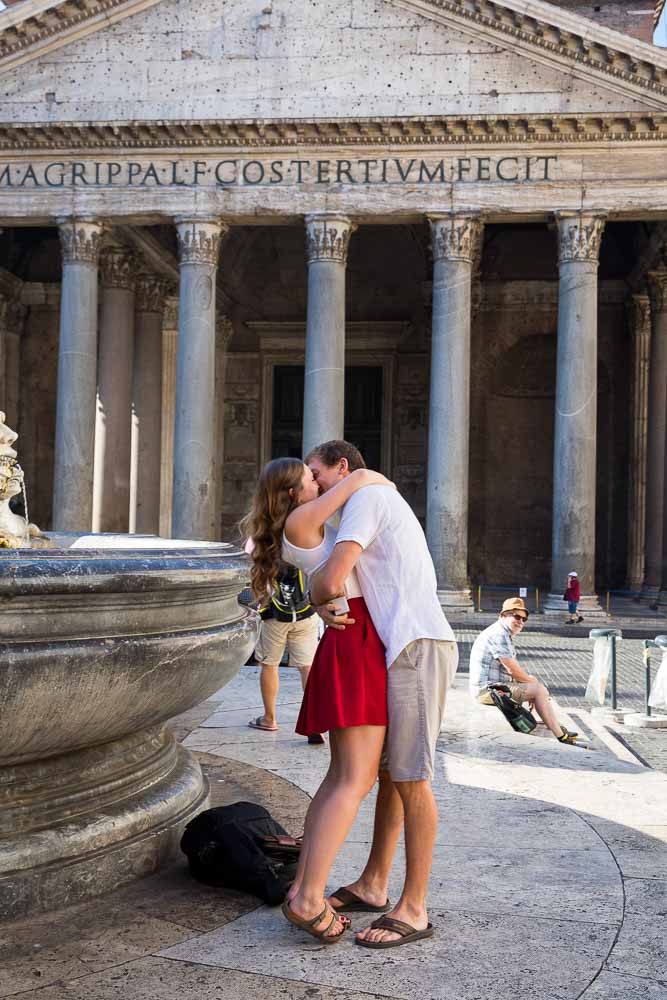 Cheerful yes engaged couple embrace Roman Pantheon Proposal