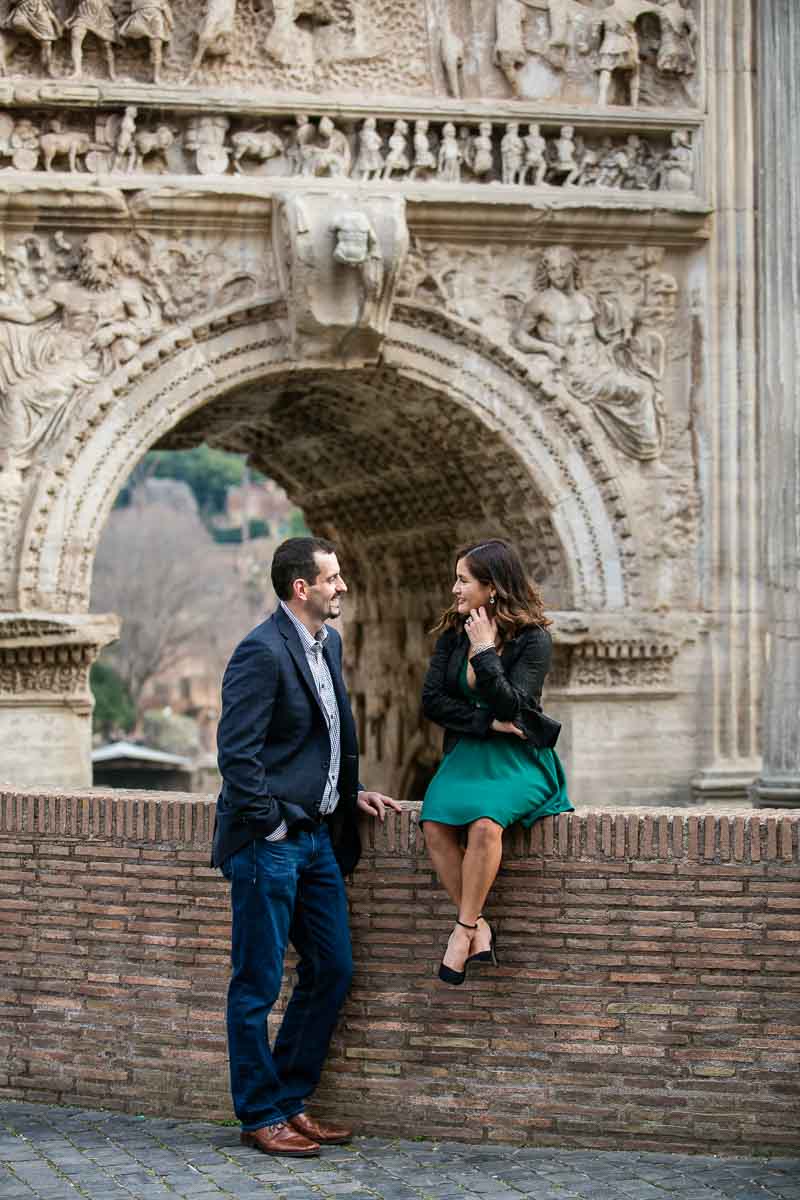 Posed picture portrait engagement underneath the arch of septimius
