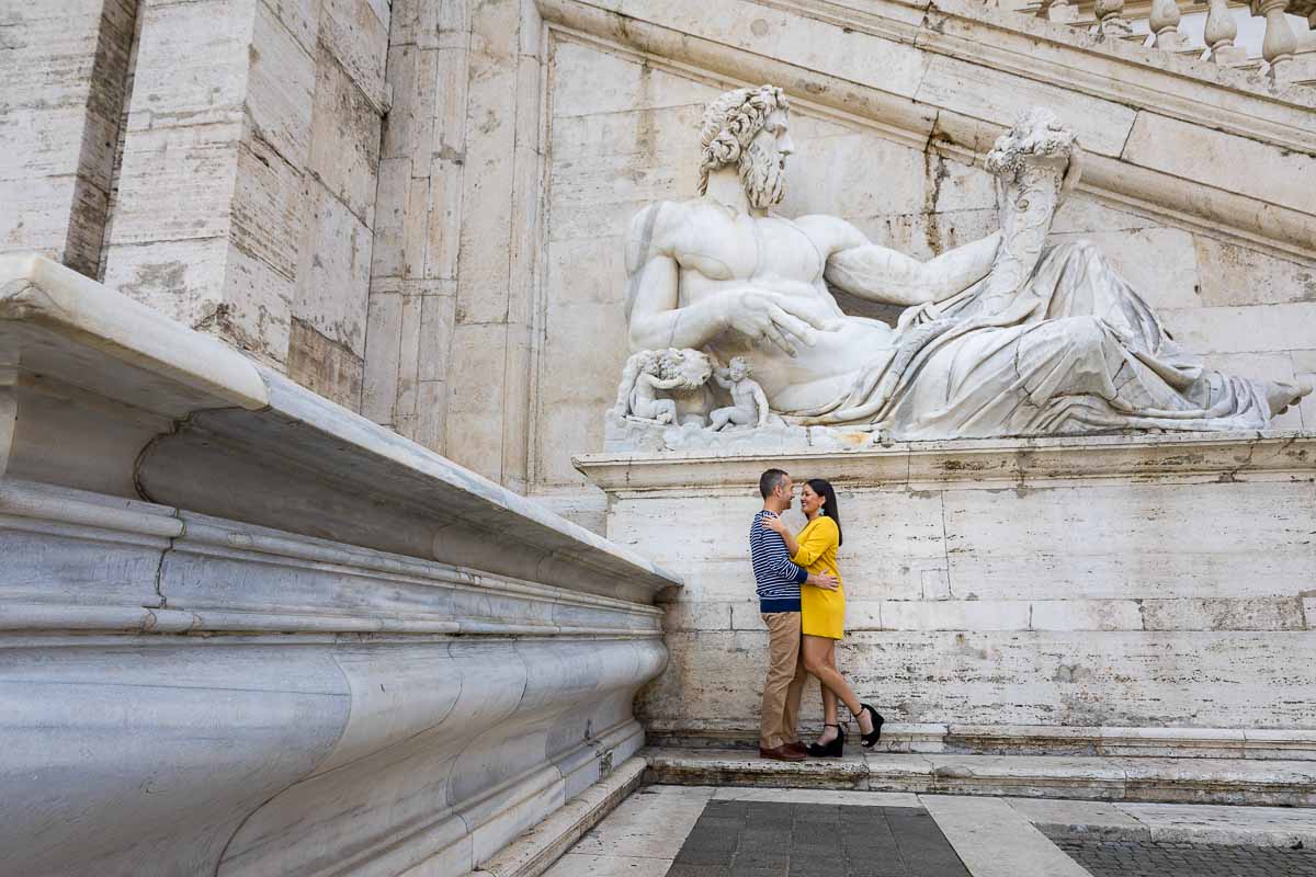 Posed photo of underneath an ancient roman marble statue found in Piazza del Campidoglio