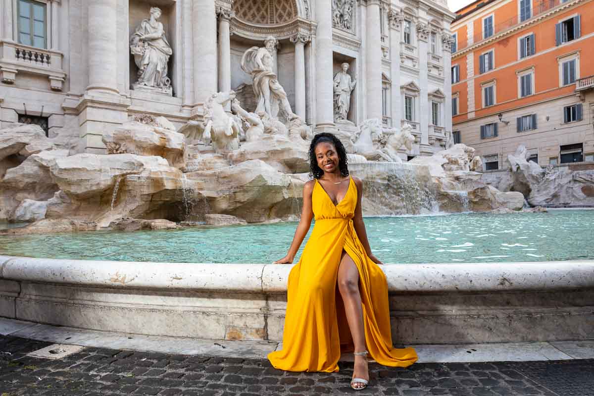 005-sweet-16-trevi-2 Close view of a birthday photoshoot with ornate marble statues behind