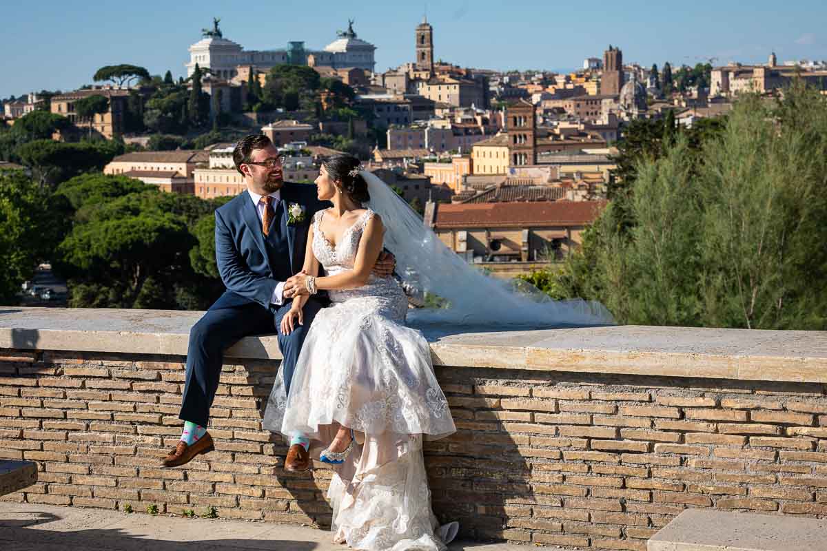 Bride and groom photographed at the Orange Garden terrace with the city of Rome as backdrop