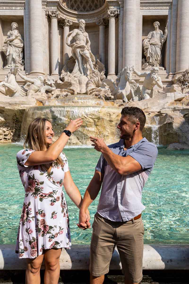 Coin toss or tossing in the fountain picture of a couple just throwing the coins