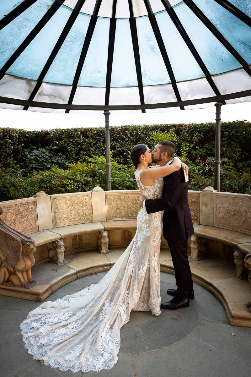 Just married in Italy. Bride & Groom first kiss. Elopement Photographer Tuscany