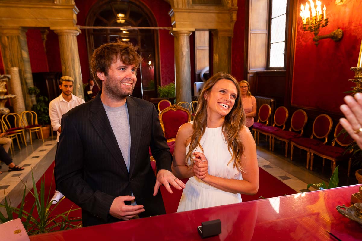 Just married in the Capitoline hill civil town hall office sala rossa with joy and happiness