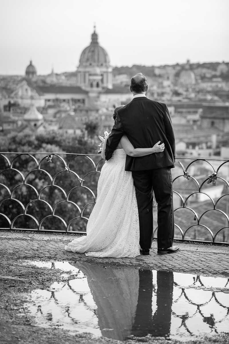 Looking at sunset over the roman rooftops in black and white conversion