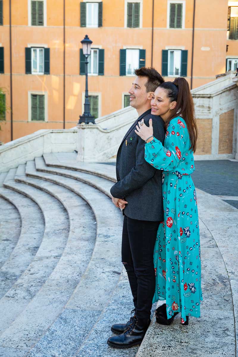 Sideway couple portrait photographed with the staircase geometrical lead away lines