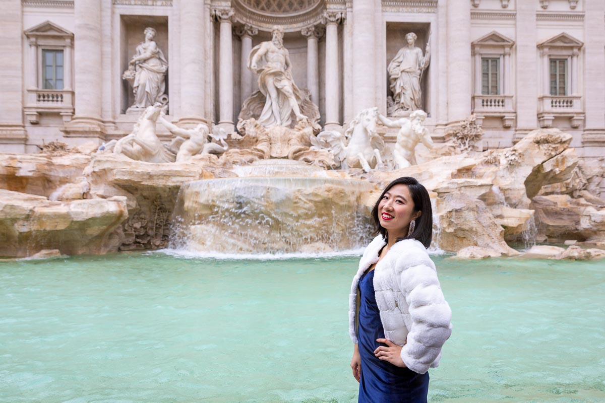 Trevi fountain Model pose taken during a Rome Fashion photoshoot