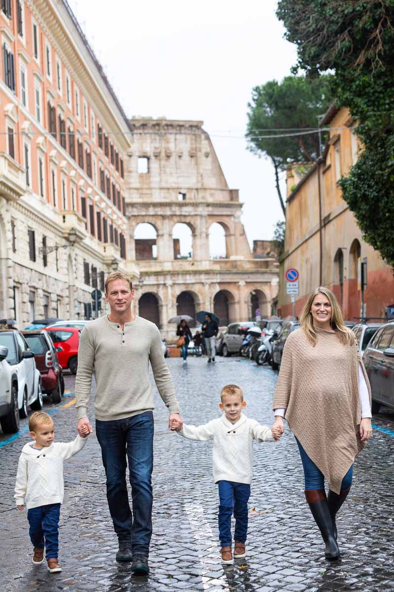 Walking together and holding hands with a very unique and incredible monument in background