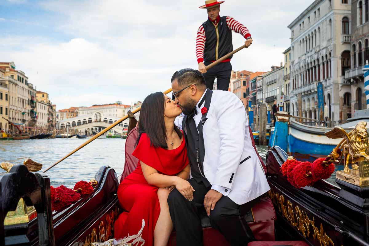 Kissing after accepting marriage proposition on a gondola ride
