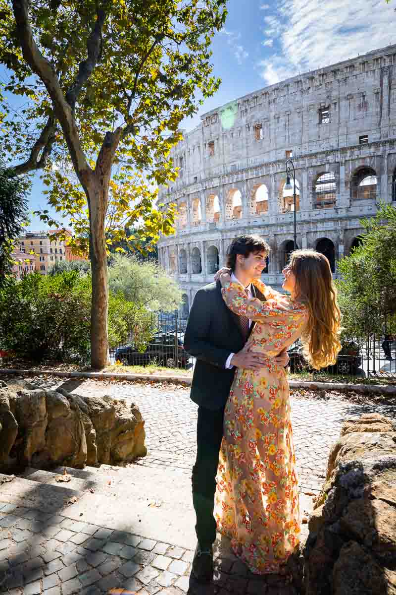 Unique and creative couple photos in the streets of Rome Italy. Engagement photography by the roman colosseum. Picture taken during a photoshoot in Italy 