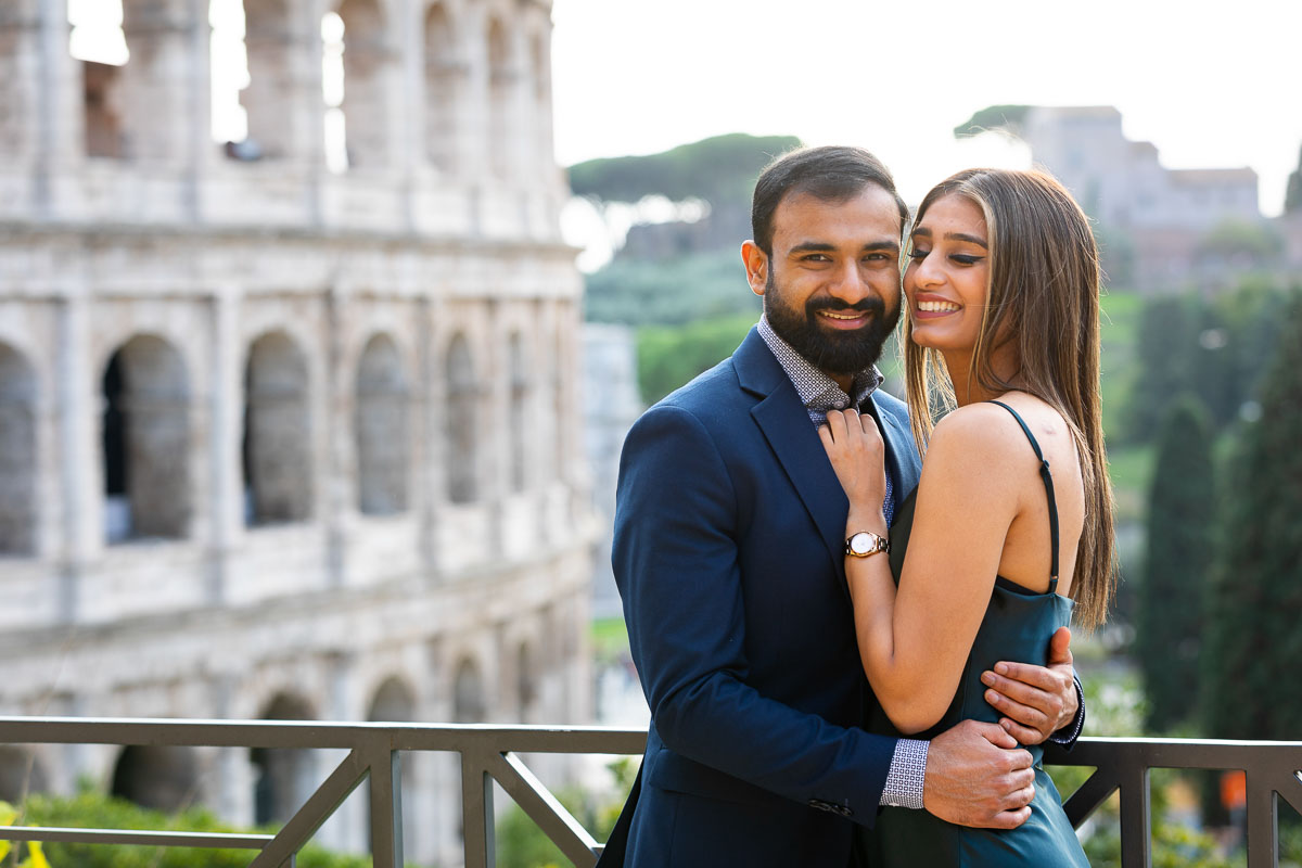 Couple portrait photographed Roman Colosseum in Italy