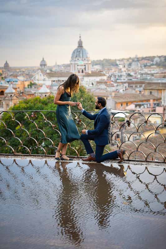 008-proposal-sequence Putting engagement ring hand