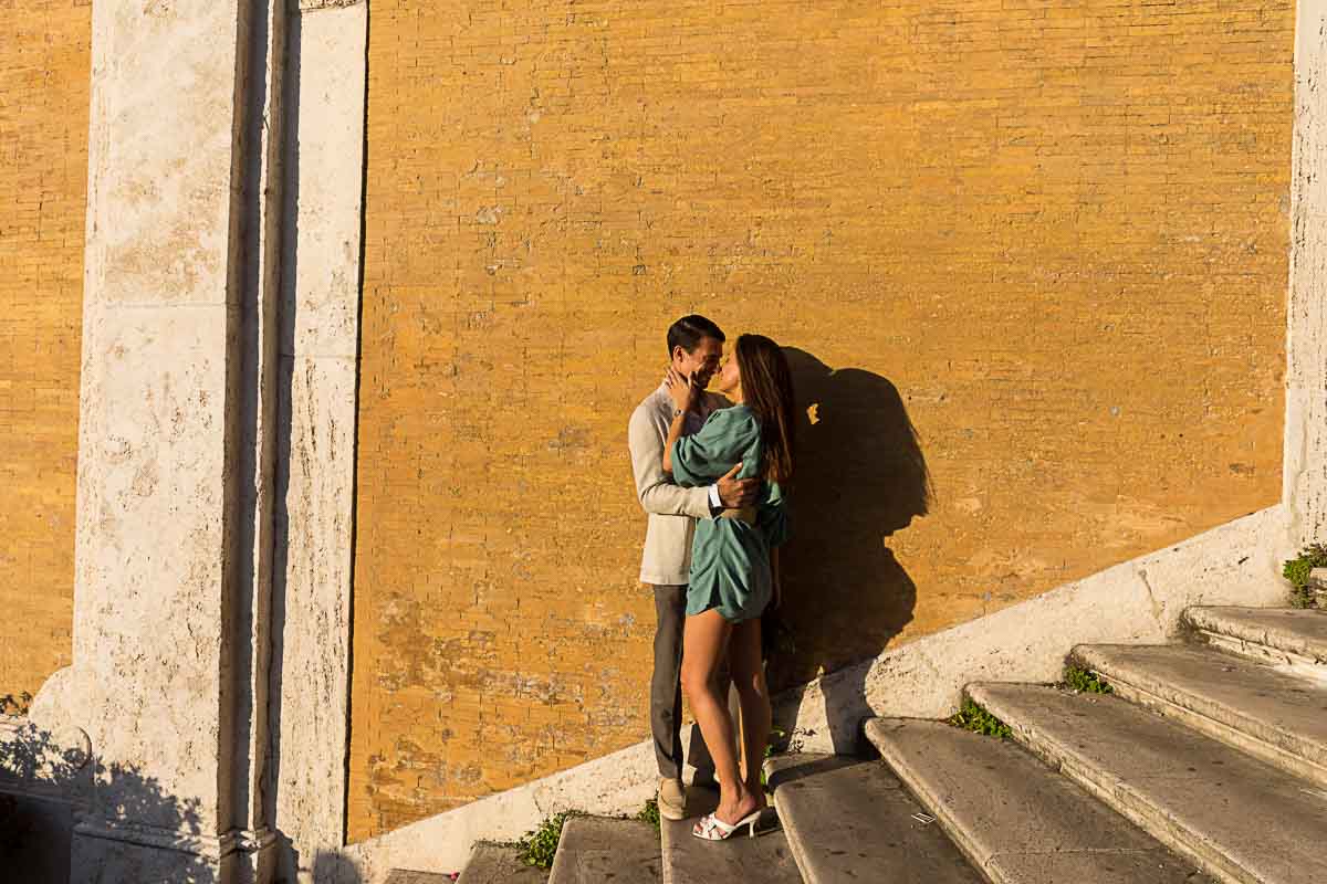 Romance Spanish steps. Couple together at sunset