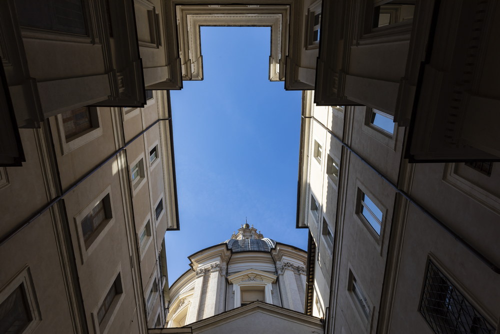 View above Church Sant'Agnese dome from the courtyard Eitch Borromini hotel Piazza Navona in Italy
