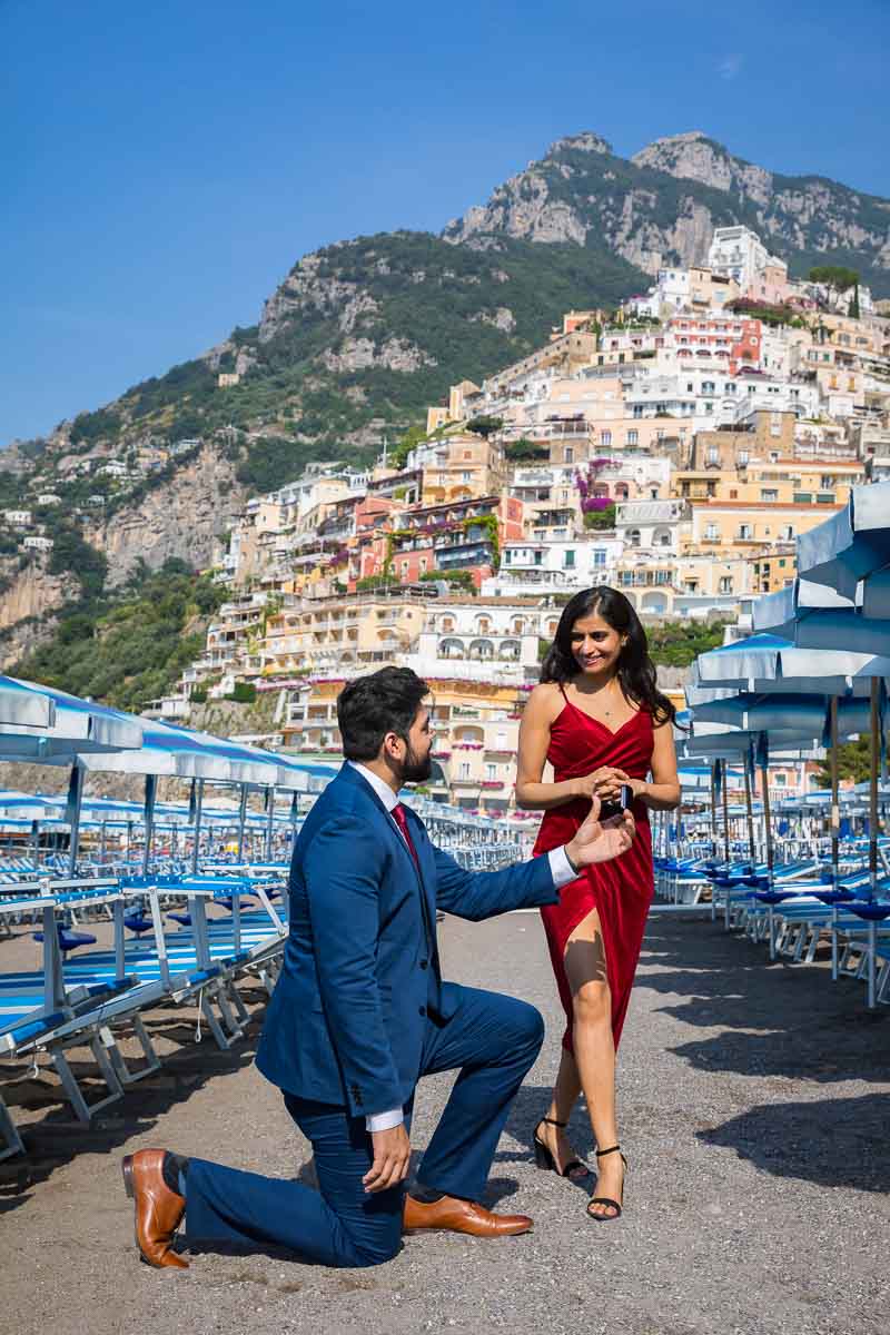 Amalfi Coast marriage proposal documented with bokeh effects to isolate the couple from the background crowds