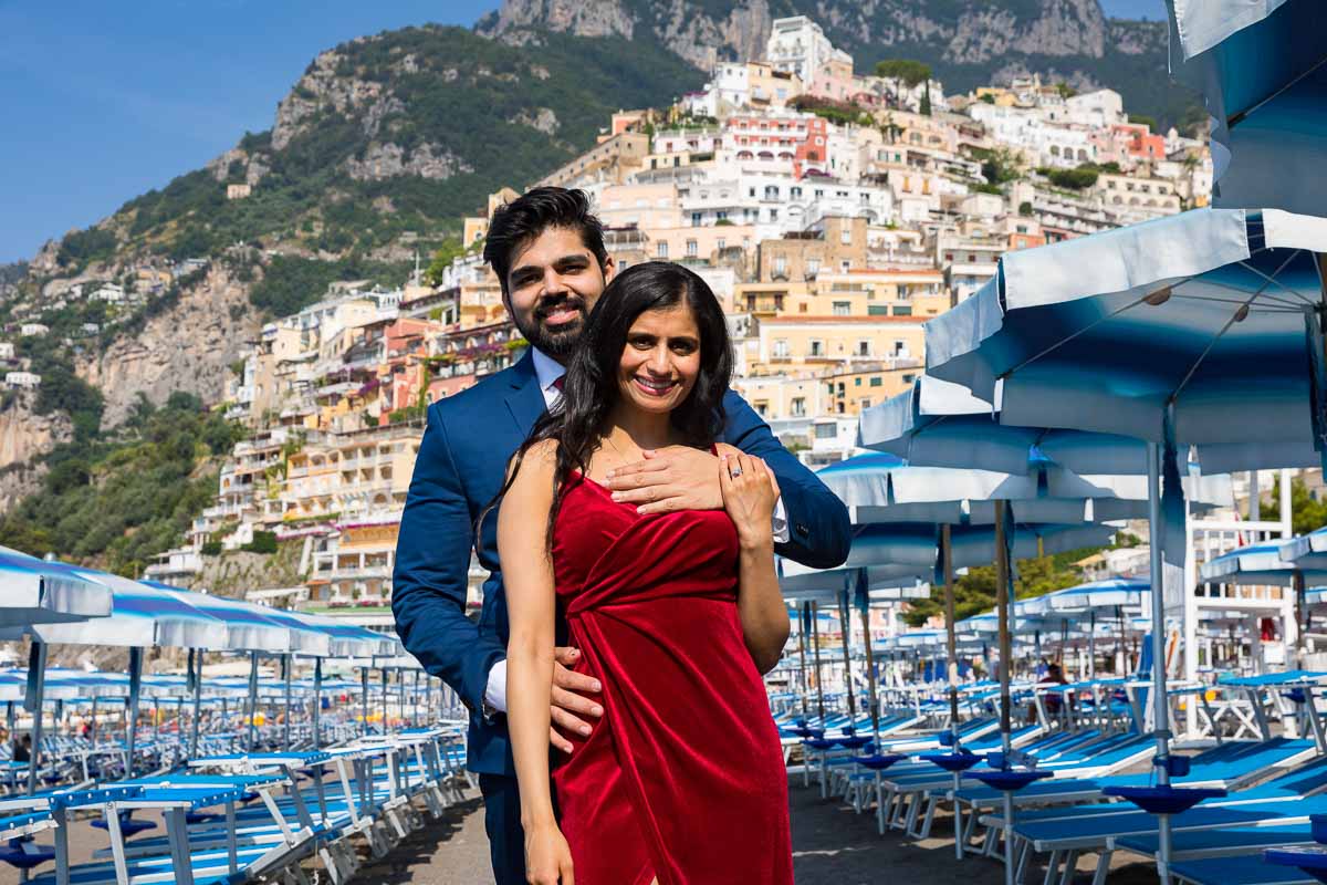 Just engaged couple portrait photographed on a beach resort town
