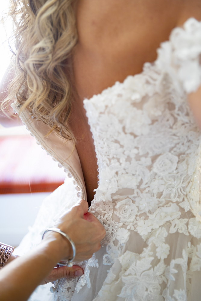 The closing of the bridal dress