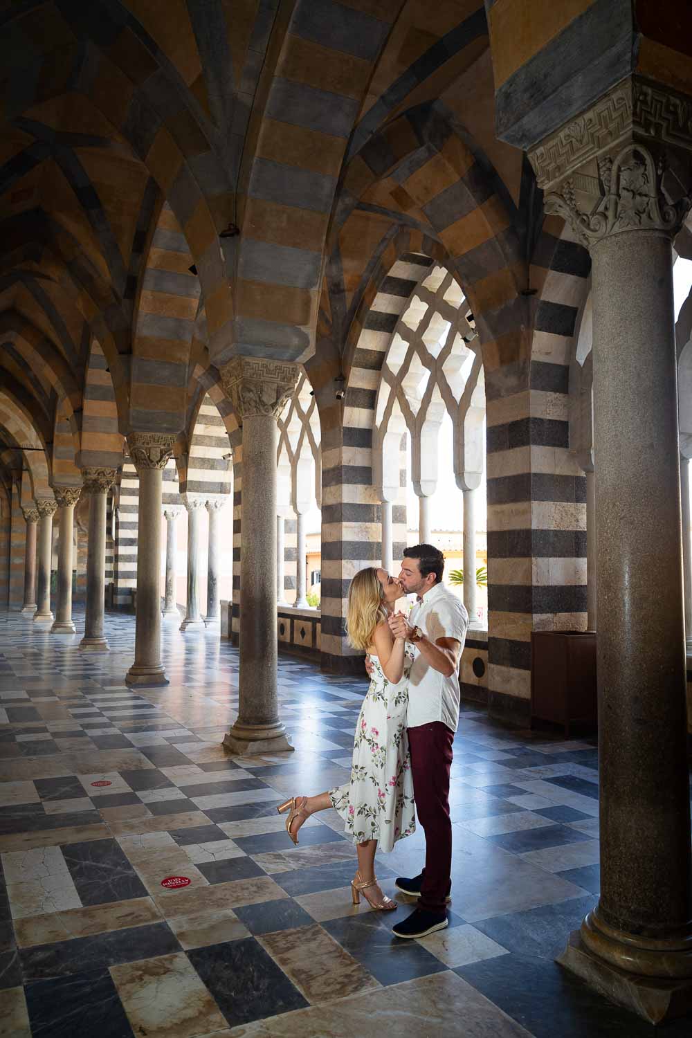 Standing and taking photos among the columns Duomo