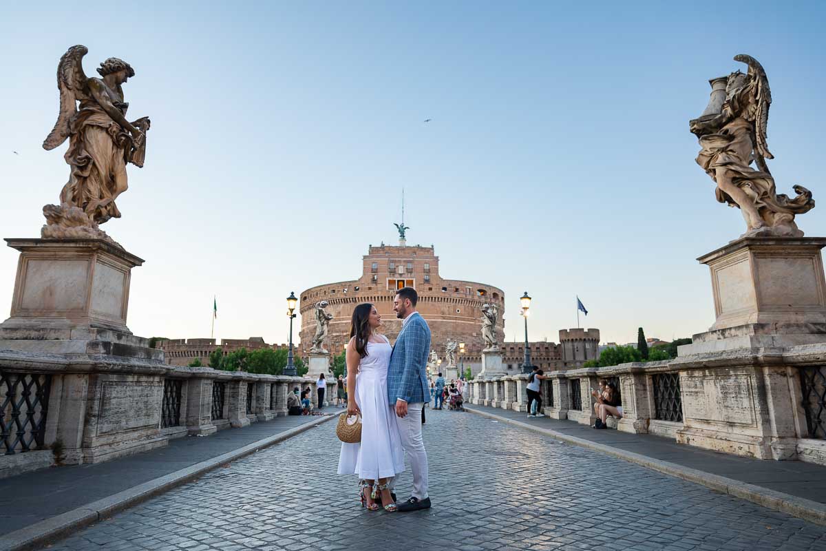 Couple photography taken on the bridge of Castel Sant'Angelo