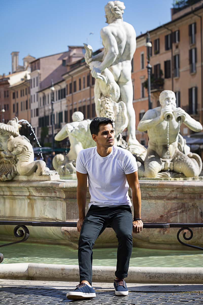 Solo photography: male model portrait sitting down by the Moorish fountain found in Piazza Navona