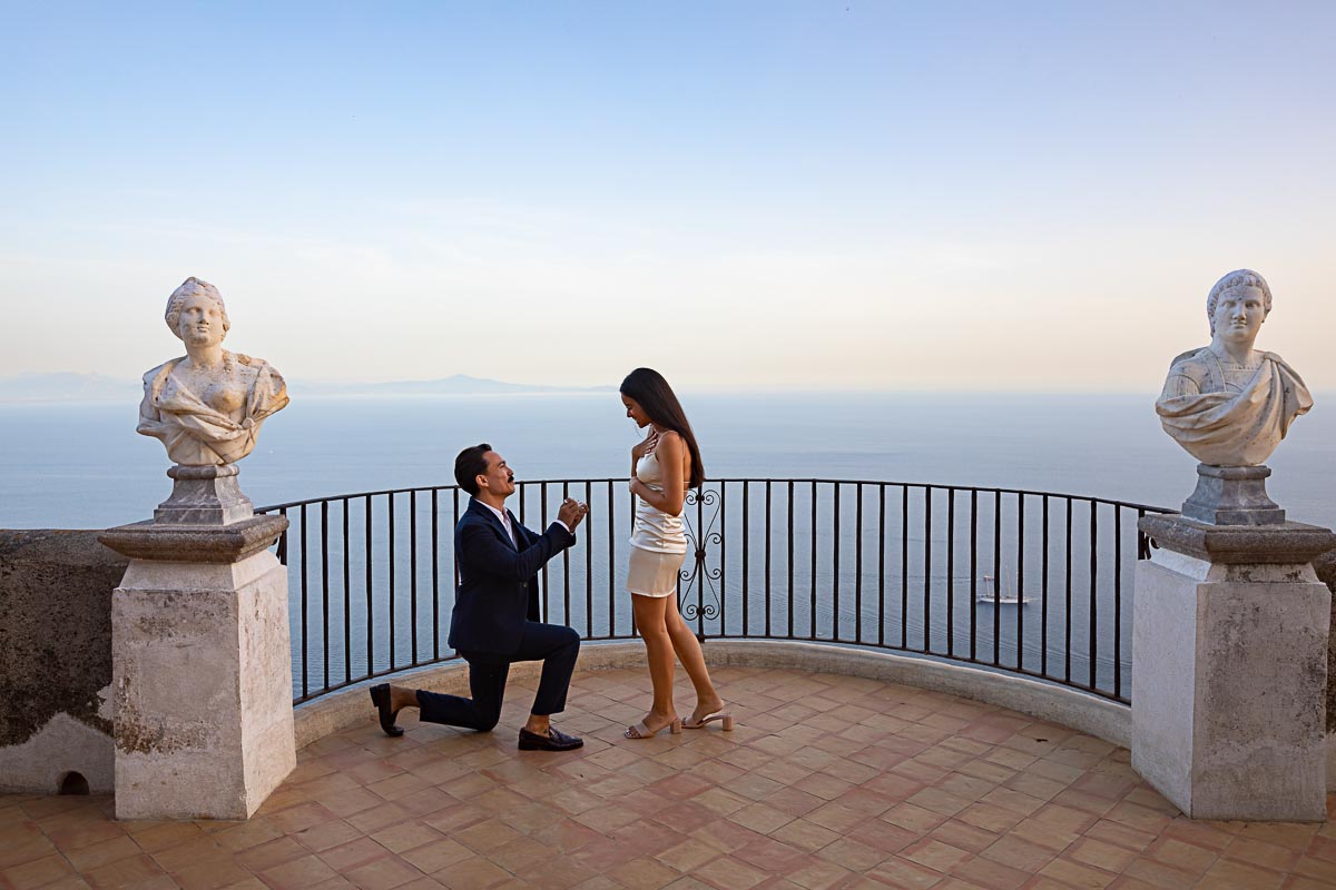 Knee down Ravello engagement session at Villa Cimbrone utilizing leading lines to emphasize the panoramic view