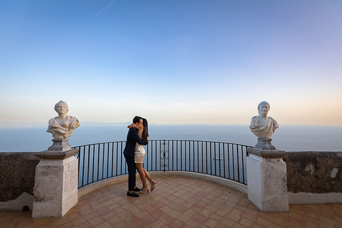 003-ravello-photoshoot Embracing after a wedding proposal on the Infinity terrace of Villa Cimbrone, Italy