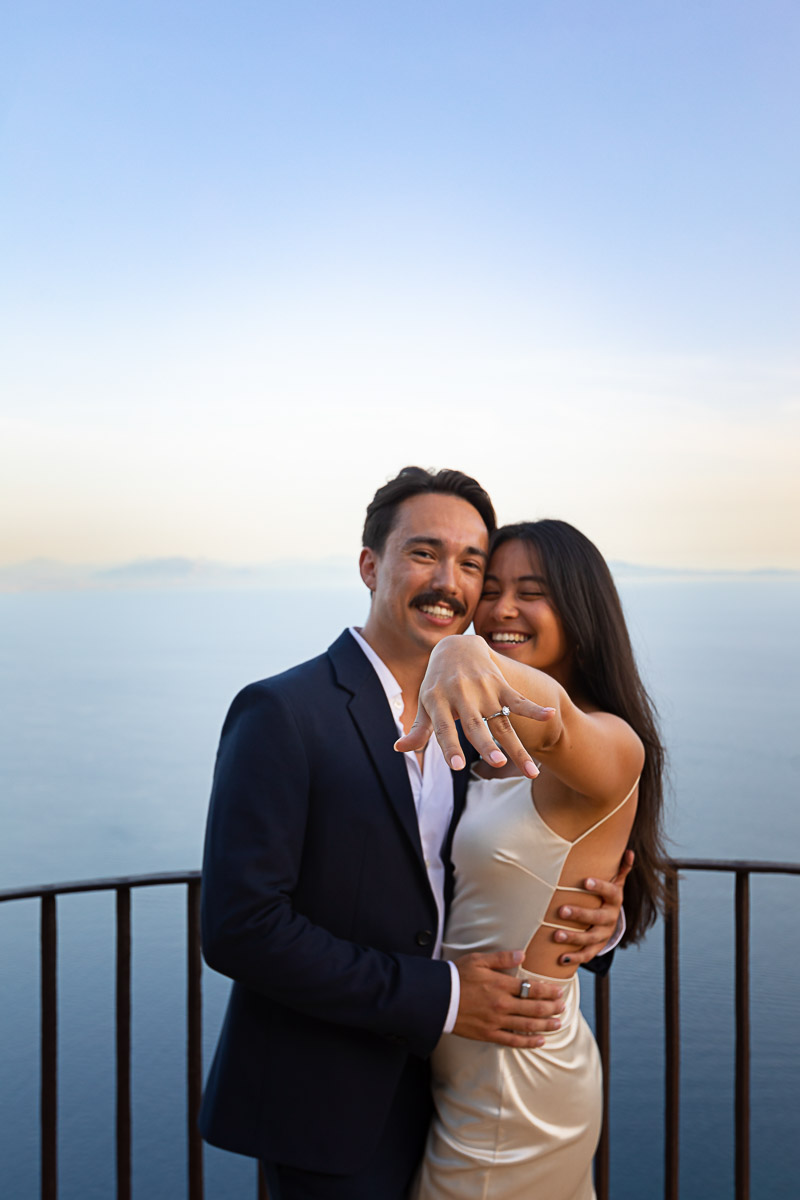 Couple showing the engagement. Just engaged in Italy
