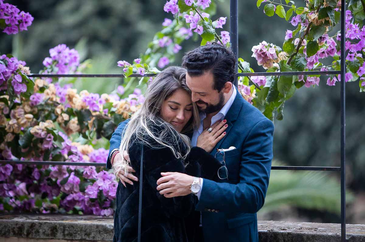 Couple together Borghese garden by the park