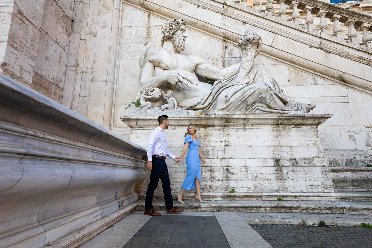 Walking underneath an ancient roman marble statue