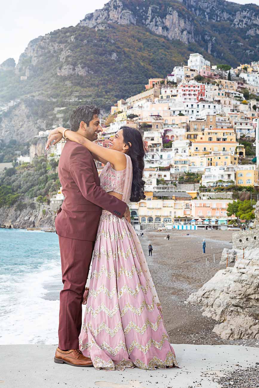 Engagement portrait picture with the town of Positano as backdrop