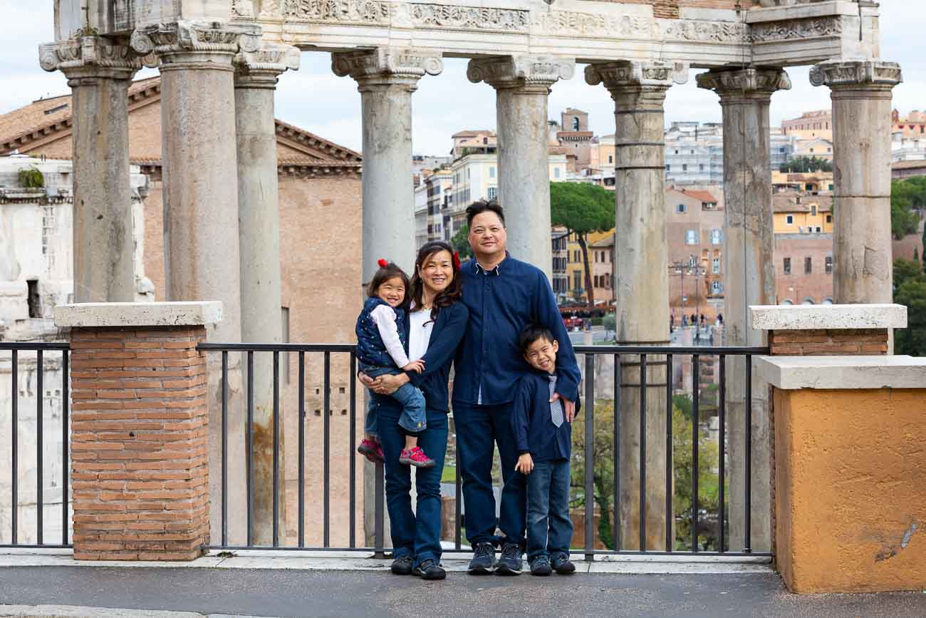 Family photo taken in front of the Roman Forum in Rome Italy.