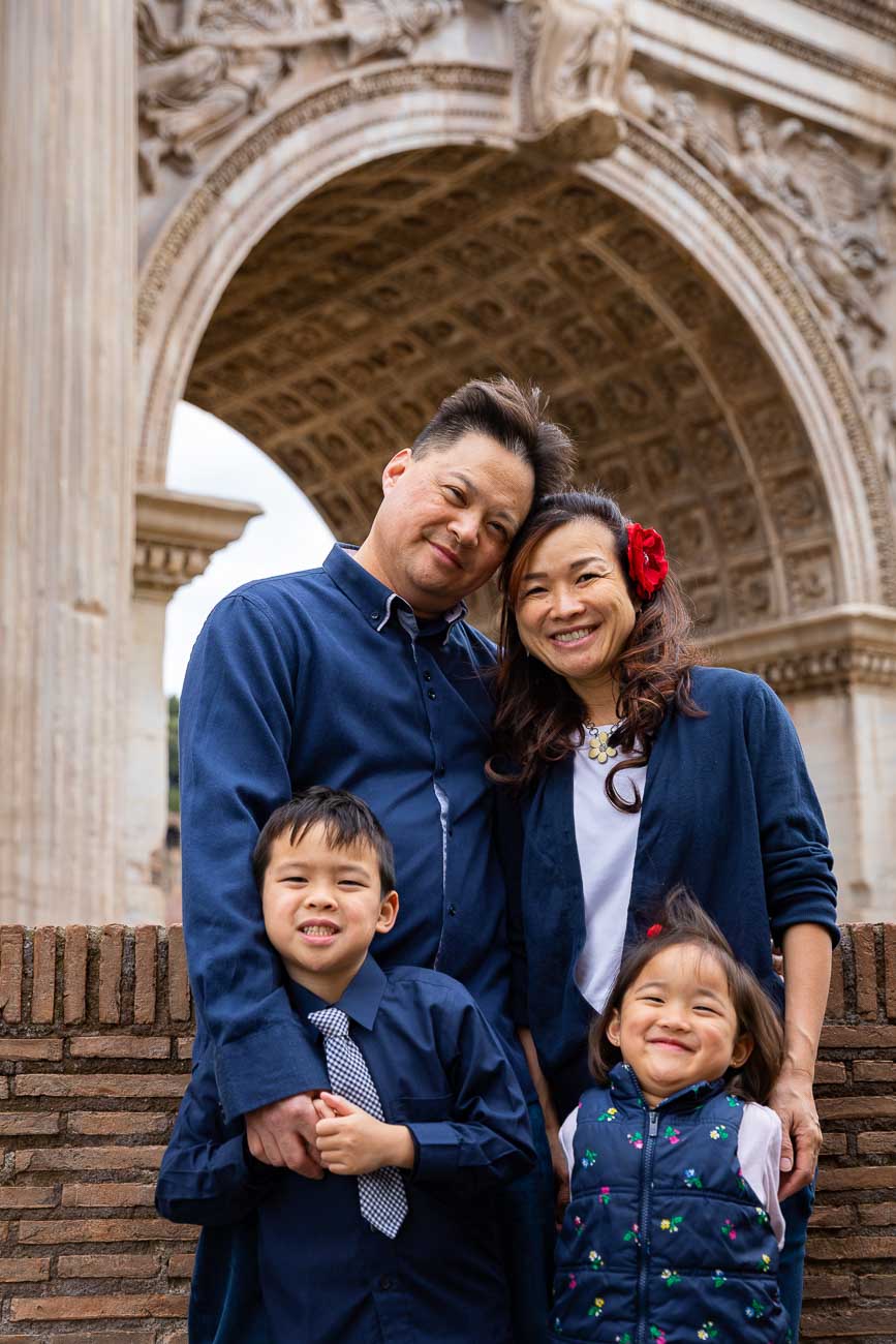 Posed portrait of a family during a photoshoot in Rome Italy