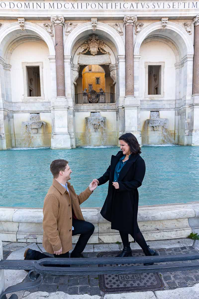 Proposing knee down. Janiculum water fountain. Rome, Italy