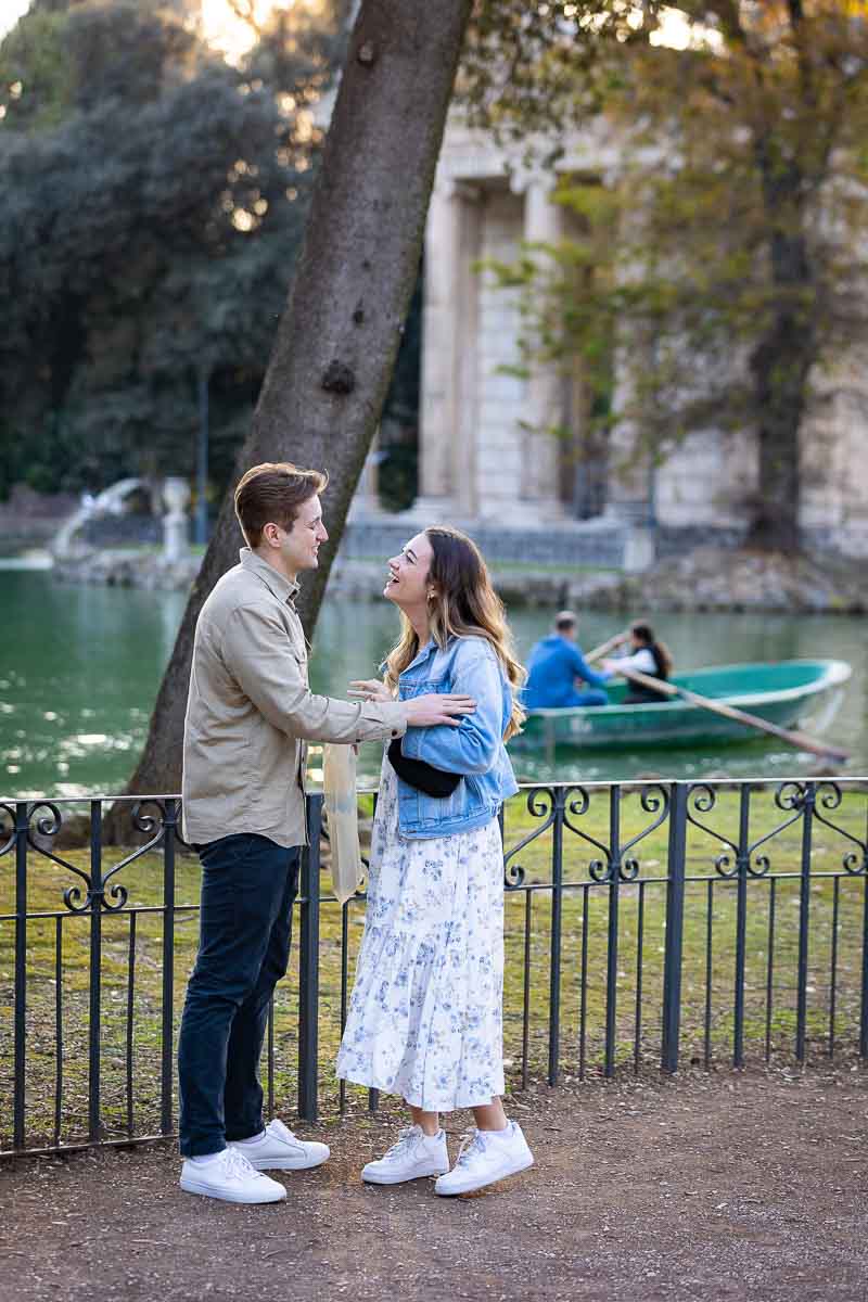 Surprised by a wedding proposition while walking by the lake in Villa Borghese. Italy.