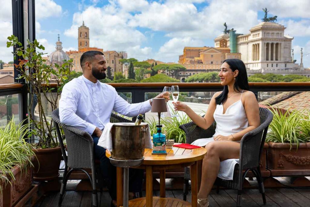 Toasting and celebrating engagement in Roma during a couple photo shoot