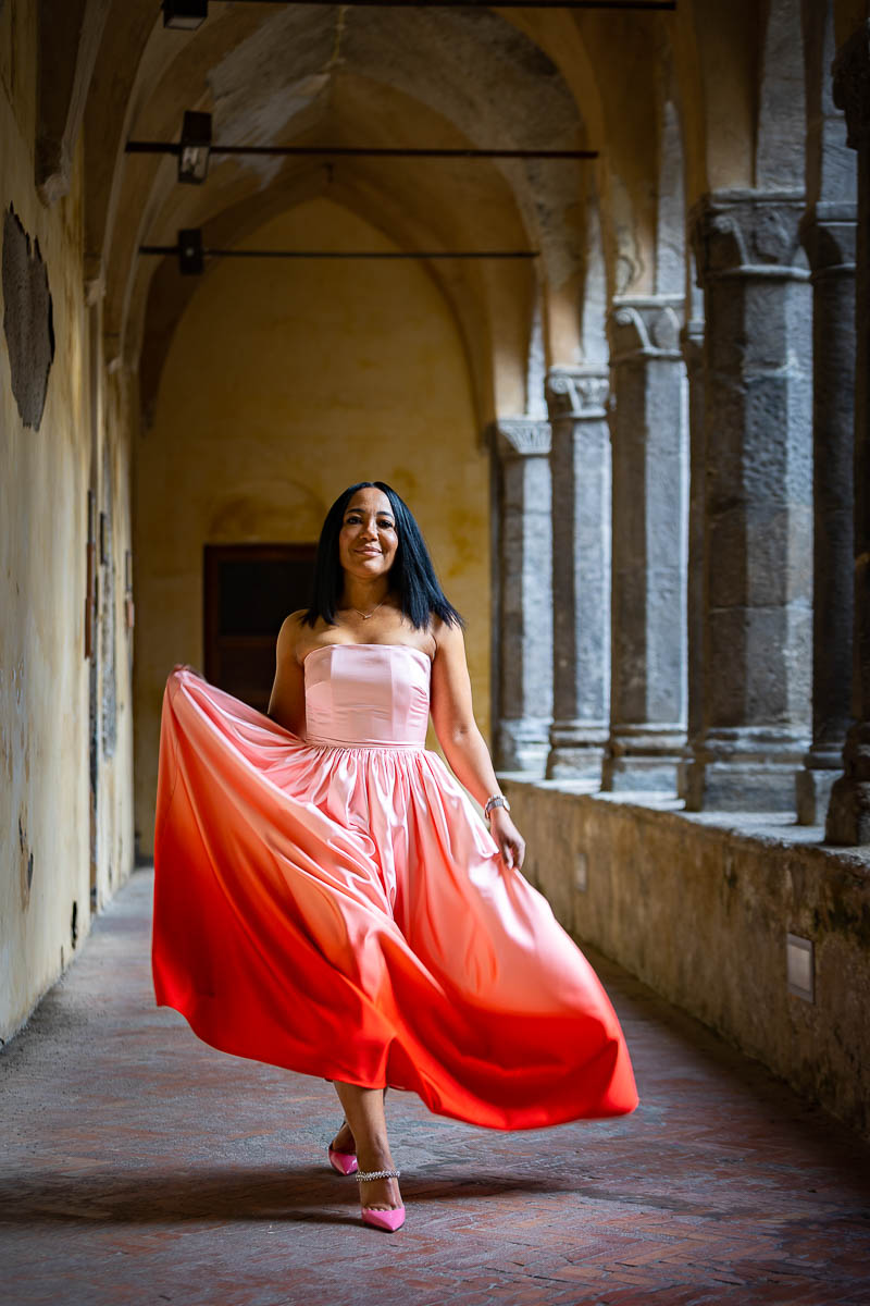Walking under the cloister of San Francesco in Sorrento Italy during a photo shoot
