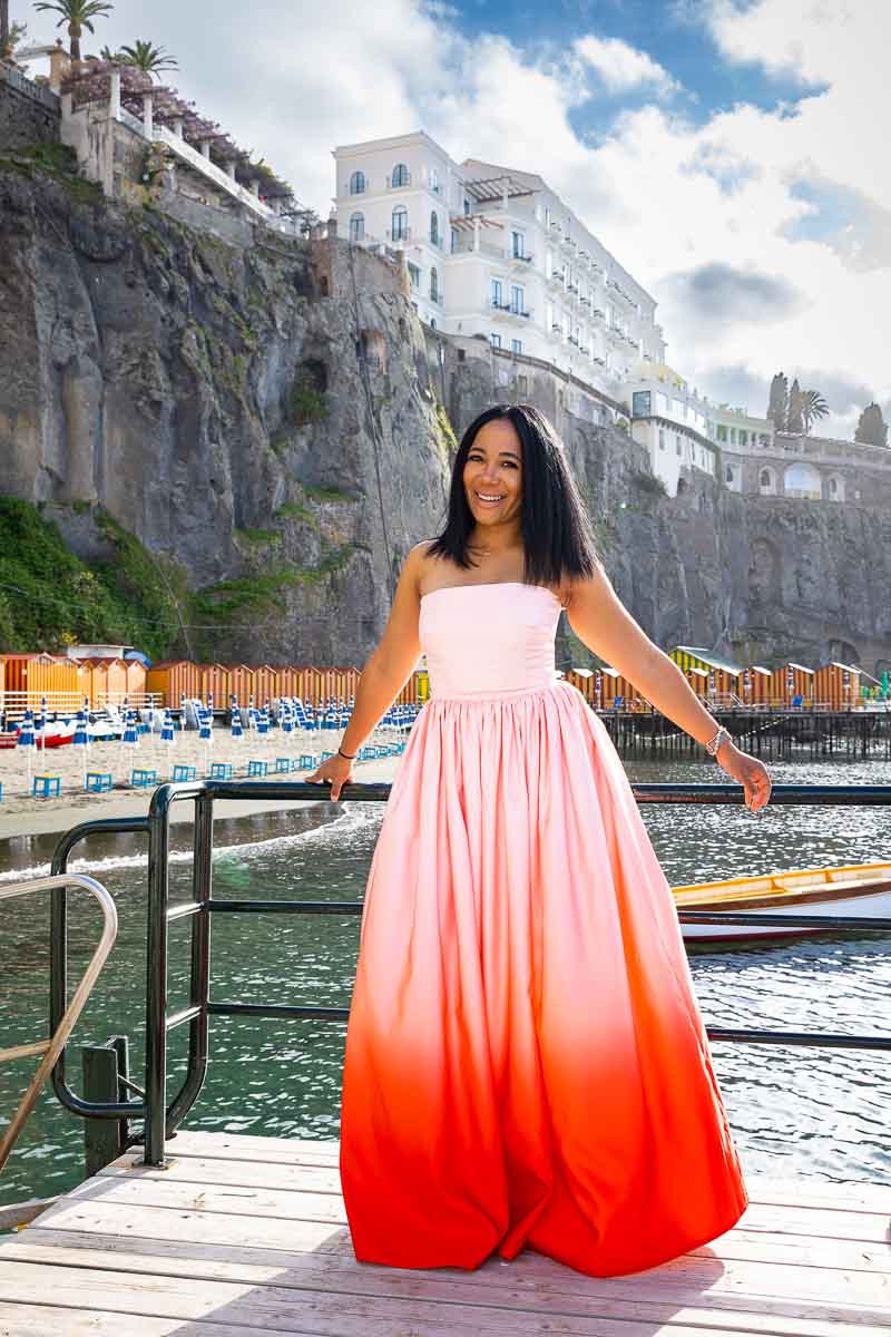 Standing by the water under the town of Sorrento