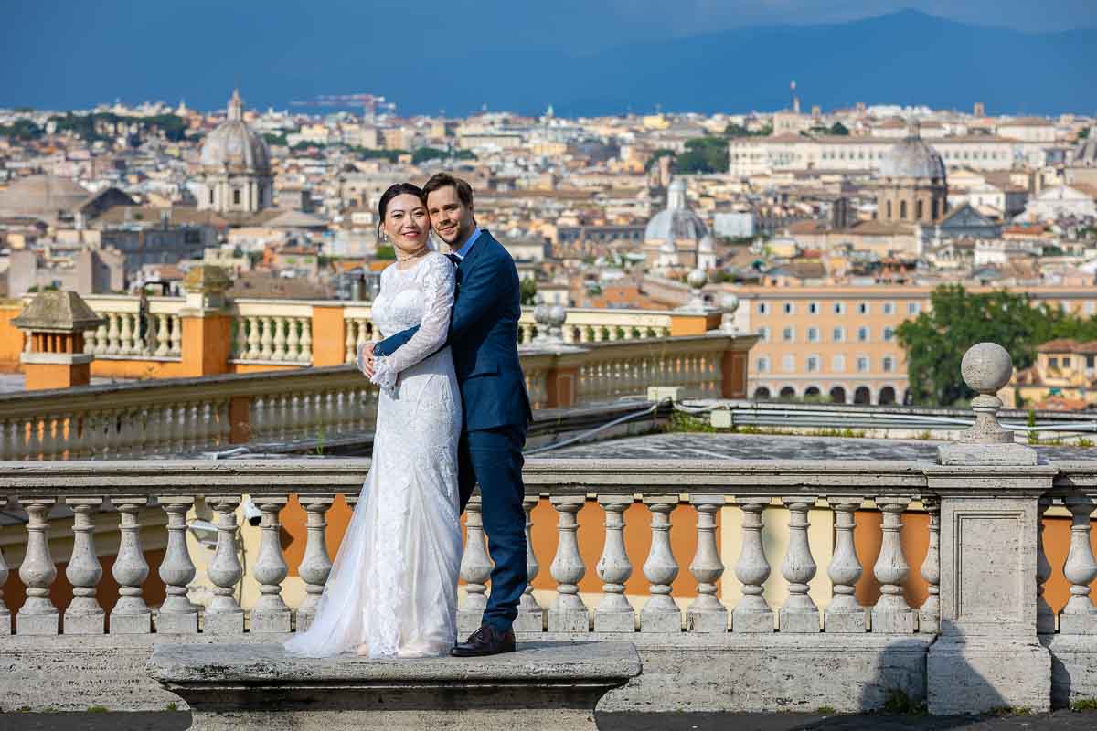 Posed picture bride and groom taking photos in Roma