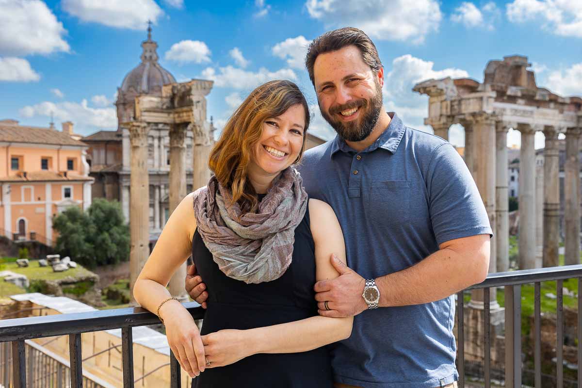 Happy portrait taking pictures while visiting image taken by roman forum