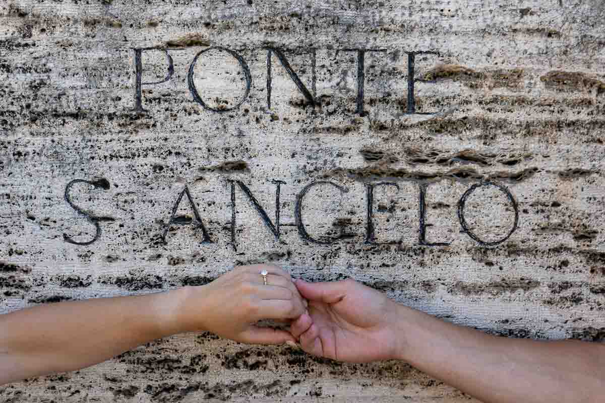 08-engagement-ring-encryption Picture of the engagement ring over the Ponte S.Angelo ancient encryption