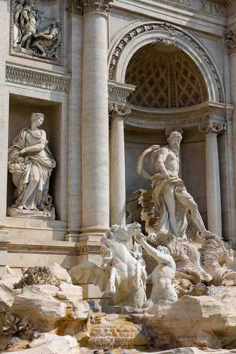 Trevi fountain marble statue close up vertical framing