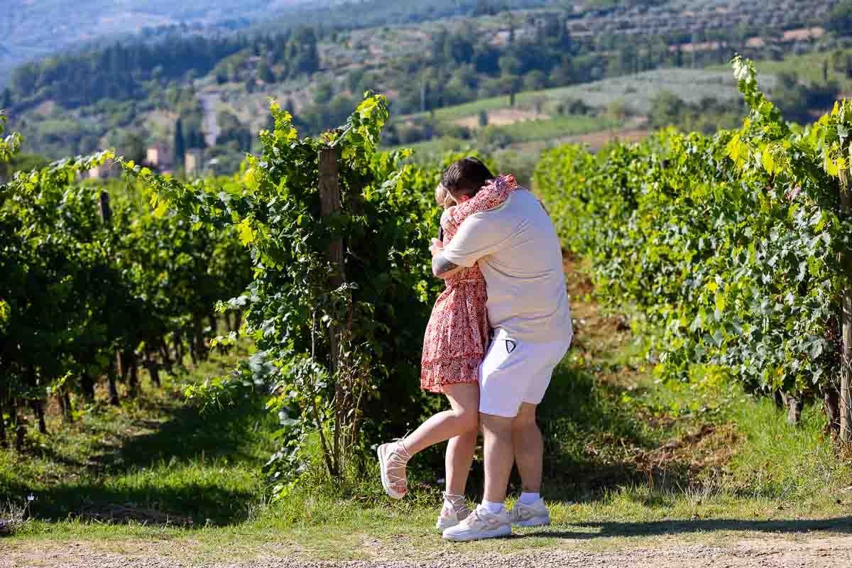 Chianti region is where he proposed. The she said yes moment in front of a tuscan vineyard 